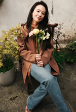 李梦在寻常巷陌里邂逅春天